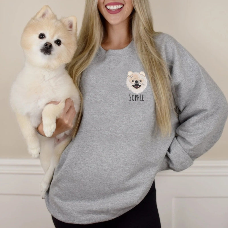 Sweatshirt with custom pet face and pet name. Custom embroidered